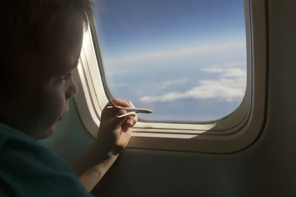 child on a plane